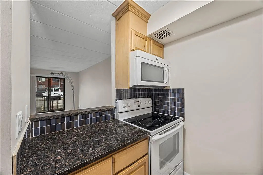 10842 Flatlands 9th St APT 25B - Photo 5